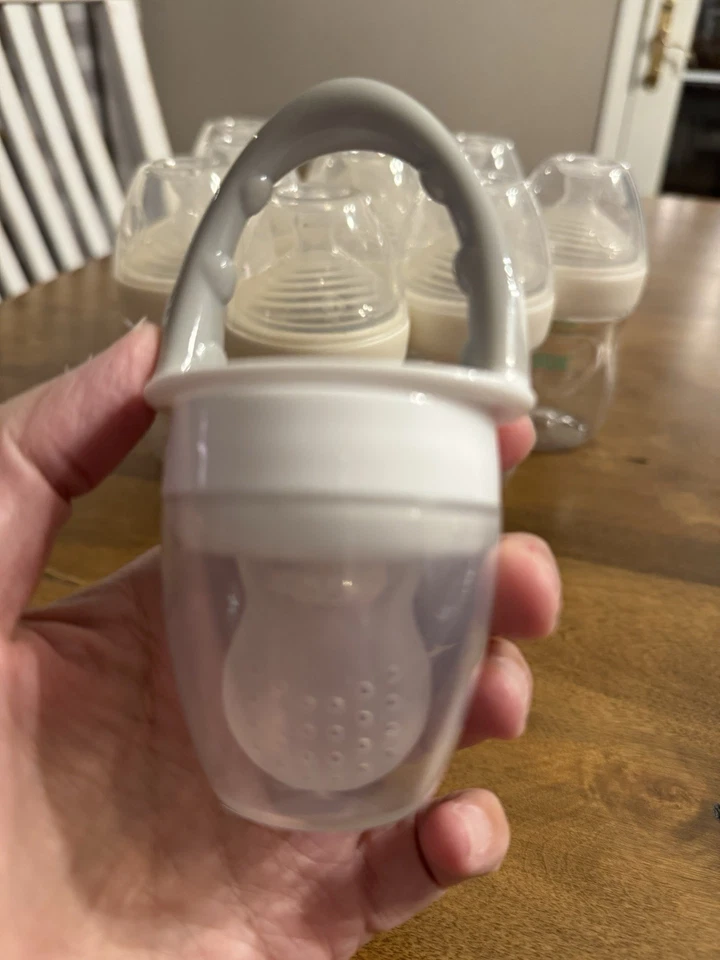 Juego de 9 biberones Nuk de 5 oz con 1 introductor de alimentos Dr Brown Foto 2 de 4