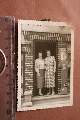 Great old photo two women in front of photo shop advertising Agfa and Perutz 