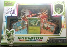 Pudełko kolekcjonerskie Pokemon Sprigatito Paldea. Puste paczki, wszystko inne w zestawie.