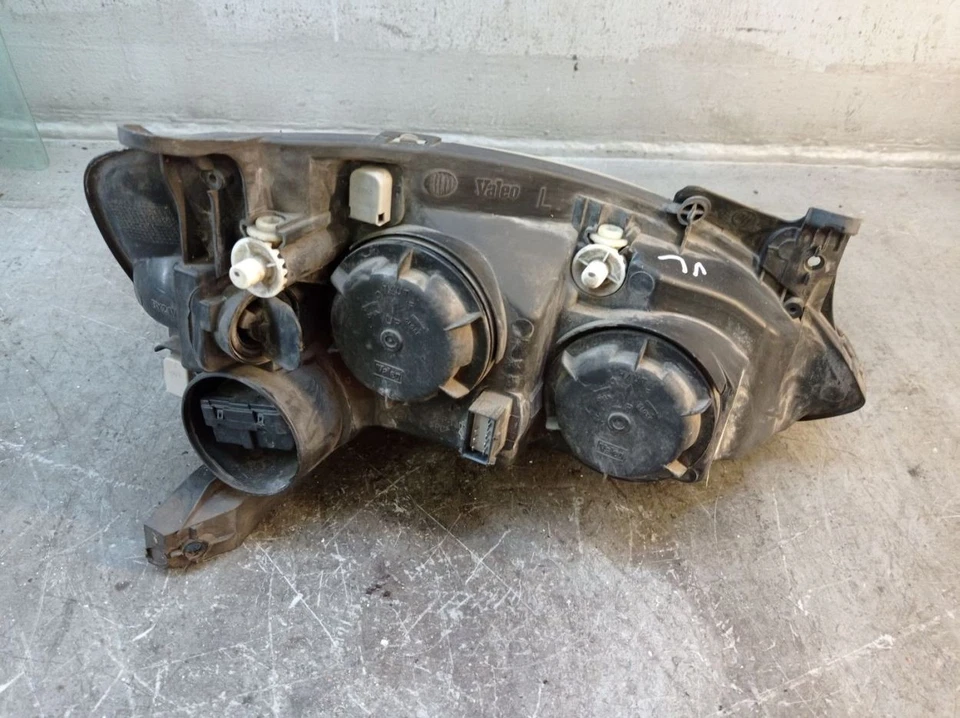 Faro izquierdo OPEL COMBO C TOUR 1.4 13195923 Foto 3 de 4