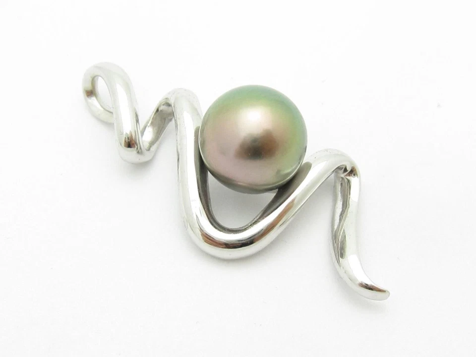 Colgante de oro blanco de 18k y perla negra de Tahití diseño único remolino perla grande