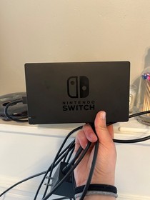 Nintendo Switch console with dock + cables + remotes