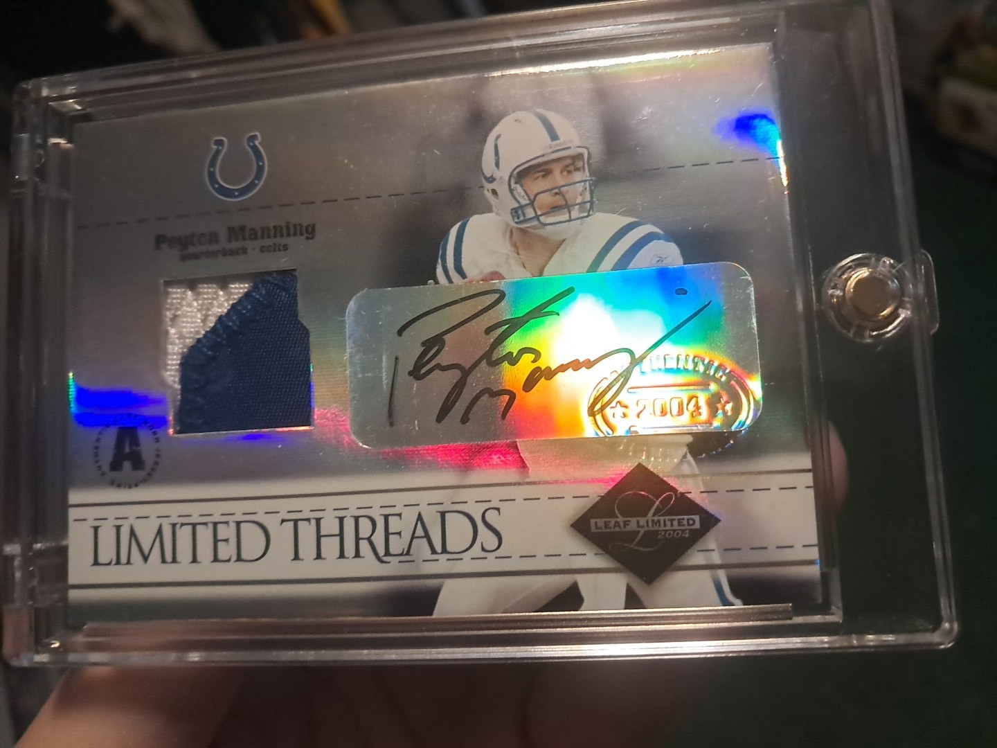 2004 LEAF LIMITED THREADS PEYTON MANNING GAME USED PATCH AUTO /25 DIRTY PATCH view 2