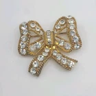 Vintage Eisenberg Ice Brooch Bow Christmas Rhinestone Gold Tone Signed