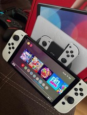 NINTENDO OLED Switch 2 Controller + 2 Spiele Pokémon