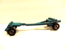 older blue tin toy equipment trailer with hard plastic wheels unbranded 