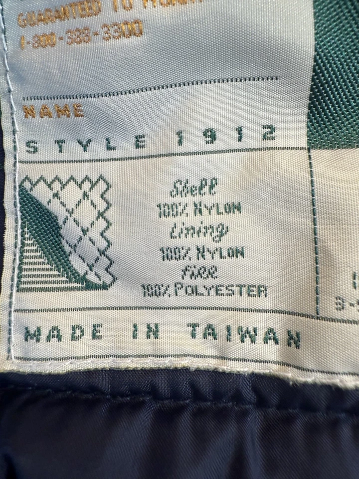 Chaleco utilitario WearGuard vintage verde para hombre ropa de trabajo grande aislado hecho en 3 estaciones Foto 4 de 4