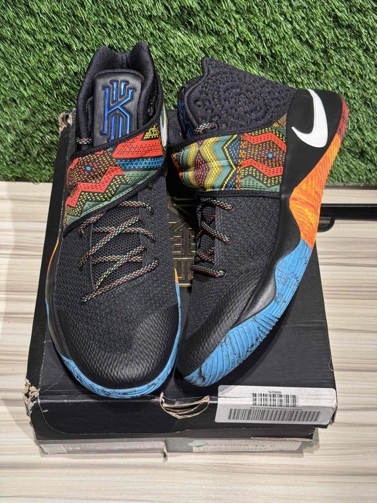 kyrie shoes green and black