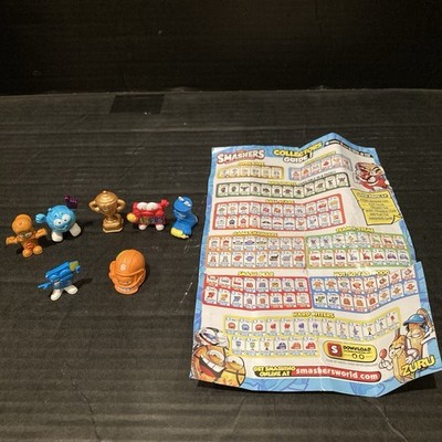 Lot of 7 Zuru Smashers, Misc Figures, Checklist Collectors Guide , 1'' Figures