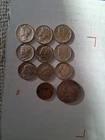 10 Silver Dimes.  6 Are Unc Merc's, 4 Circulated Roosevelt. 1 Cull Quarter.