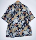 Black Hawaiian shirt men’s 2XL with orange, yellow, and blue floral print, green leaf background, and short sleeves.