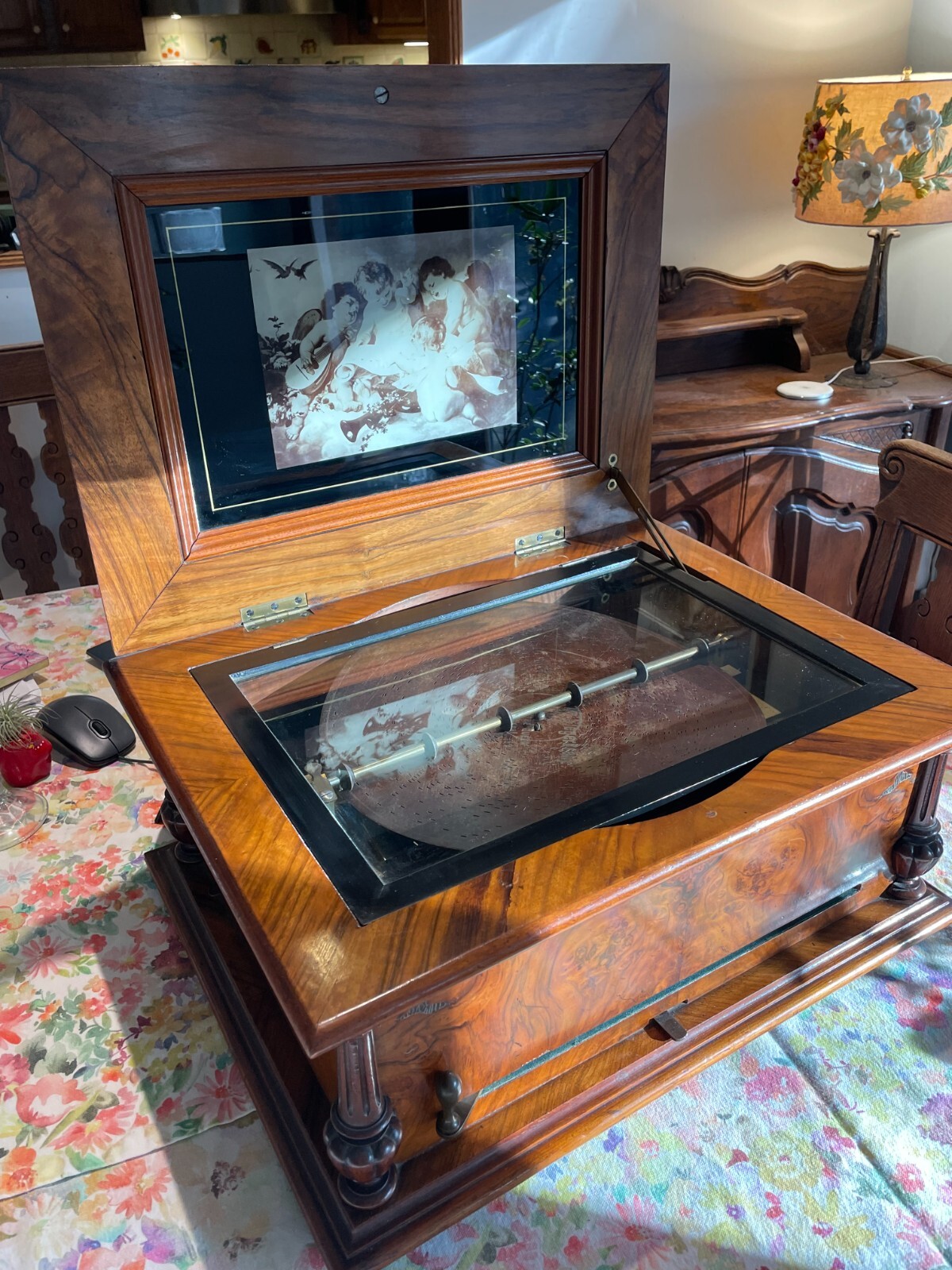 19th century gorgeous wooden music box with 37 different metal records. 