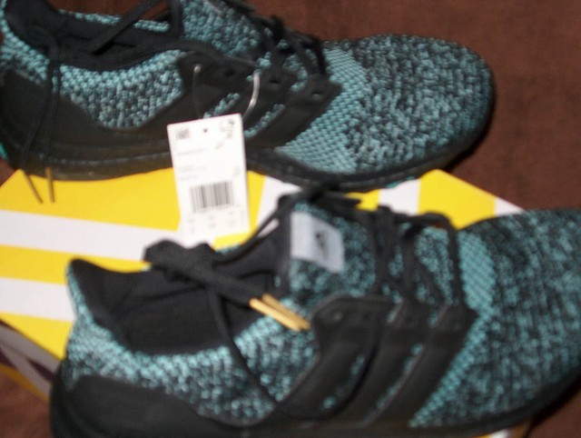 ultra boost core black  true green  gold met