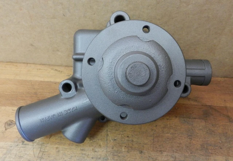 Bomba de agua reconstruida Datsun 411 R16 1966-67 1,6 L 4 cilindros con ventilador piloto de 2-1/4" Foto 4 de 4