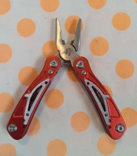 TSA PT RED W9198 STAINLESS STEEL 12 IN 1 MULTI TOOL EXCELLENT CONDITION 