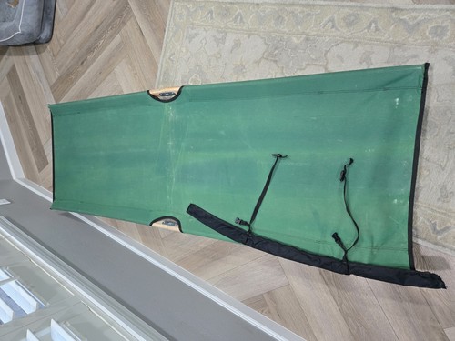 Byer of Maine Allagash Camping Cot with a wooden frame and green canvas