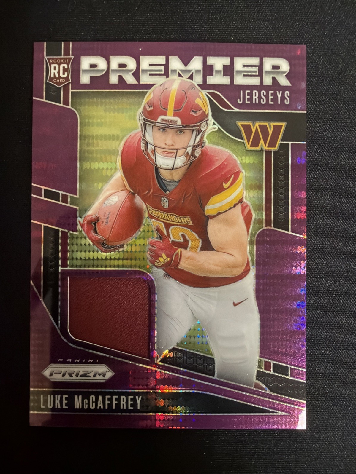 2024 Panini Prizm - Premier Jerseys Luke McCaffrey #PJ-LMY Purple Pulsar Prizm