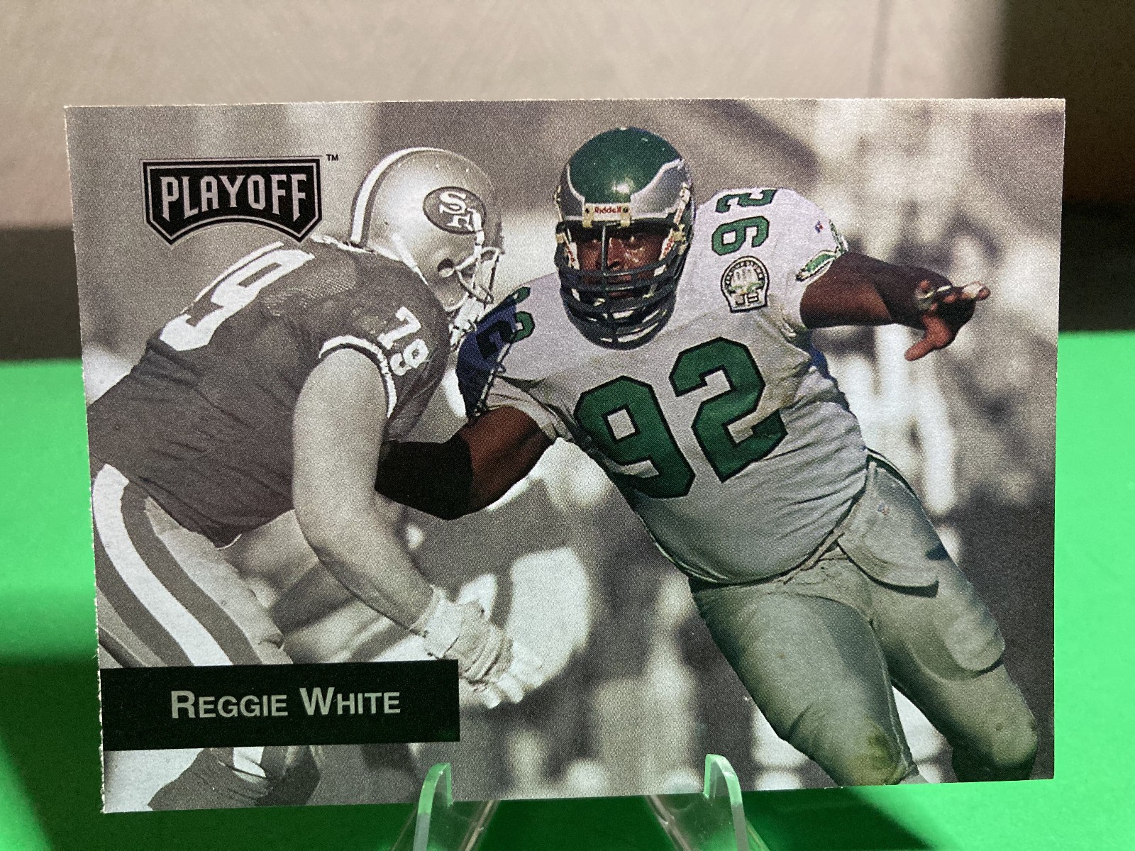 Reggie White #115 Football Cards 1993 Playoff trading card — raw and PSA graded price guide