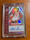 2023-24 Panini Phoenix Hakeem Olajuwon #H-HOJ Intl Red Auto Rockets 01/99