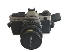Olympus OM-4T Titanium 35mm SLR Film Camera W/Zuiko 35-70mm 3.5-4.5 Lens Works