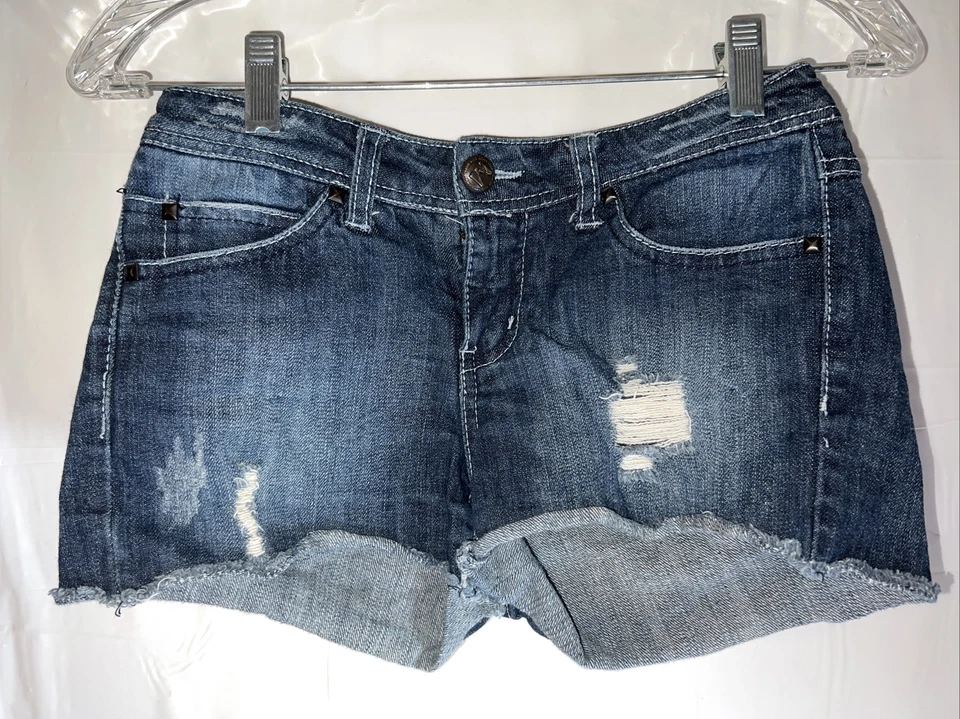 Pantalones Cortos Miley Cyrus Tiro Bajo Dobladillo Crudo Denim Elastizados Talla 7 (Cintura 28") Foto 2 de 4