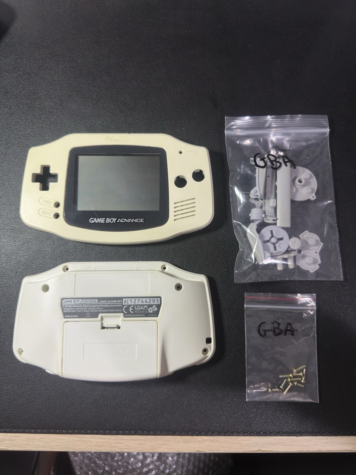 Nintendo Game Boy Advance AGB-001 kit scocca bianca pulsanti viti lente