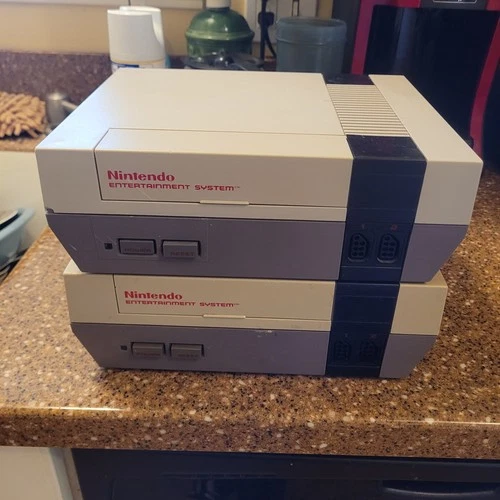 2 Vintage original Nintendo entertainment consoles Lights Flashing
