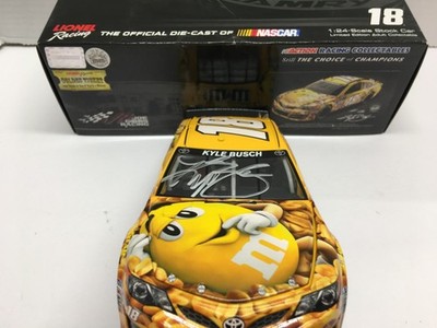 KYLE BUSCH AUTOGRAPHED #18 M&M'S PEANUT 2014 CAMRY JGR 1/24