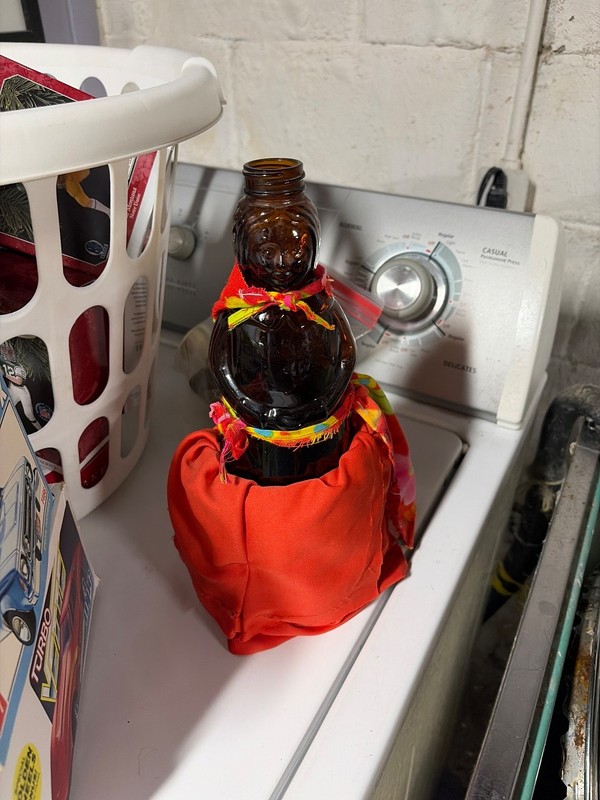 Mrs.  Butterworth's glass bottle and clothing