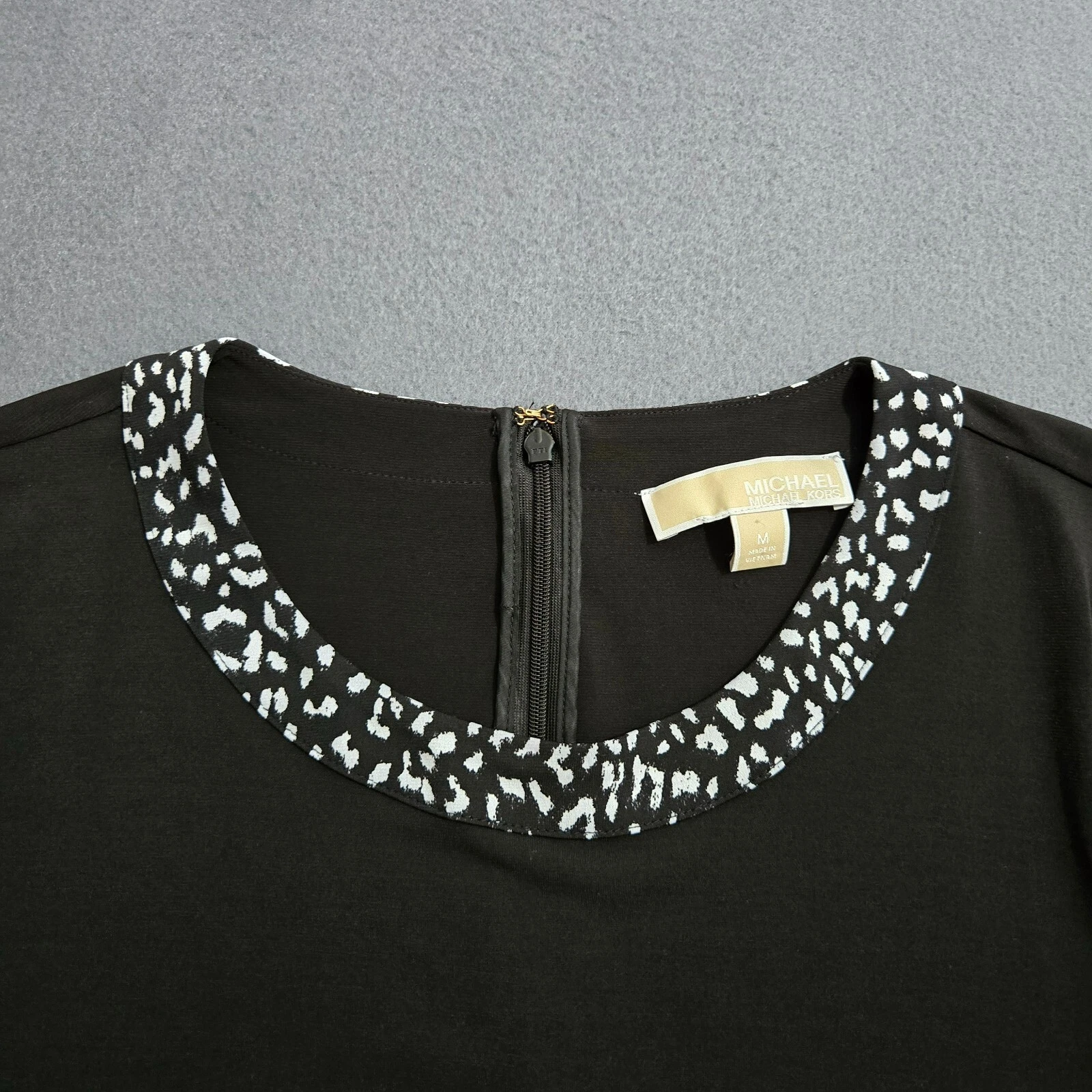 Abito Michael Kors donna M nero manica lunga con orlo stampa animalier bianco e nero