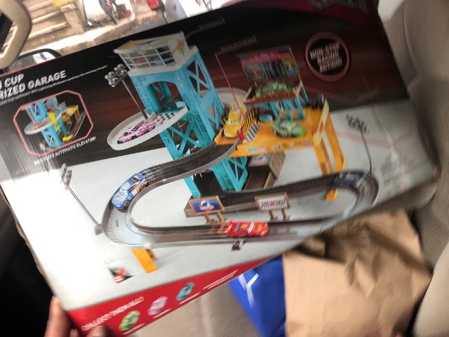 disney cars piston cup motorized garage