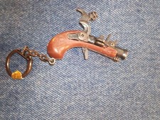 Vintage 1980 die cast cap gun keychain with caps MADE IN HONG KONG