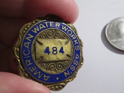 Vintage enamaled American Water Works numbered Badge pin back #684