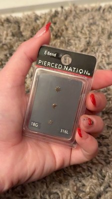 3 Piece Set Of Silver L-Bend Nose Jewelry Sun, Star, And Moon