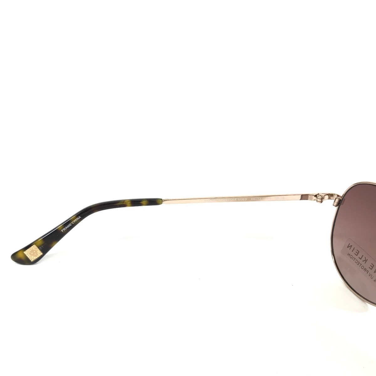 Anne Klein Sunglasses AK7024 780 Rose Gold Brown Tortoise Aviators Red Lenses Anne Klein AK7034 Sunglasses | Select Eyewear main image 4