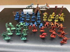 52-Piece Plastic Cowboys  Indians. Including Some Accessories. Various Colors.