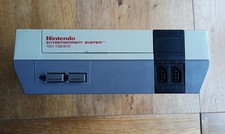 NES Console Bundle  +7 Games + Gun+2 controllers
