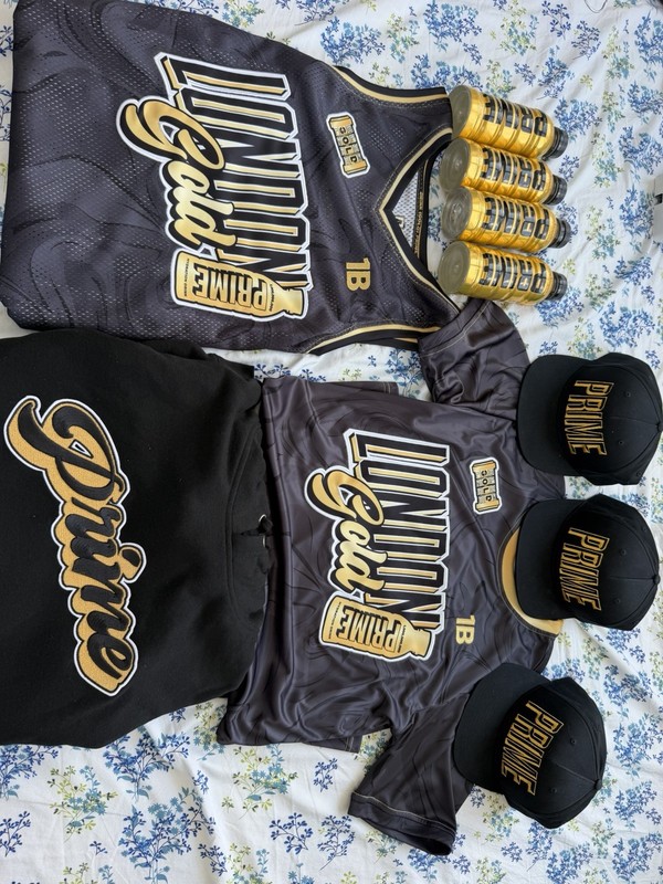 1 Signed Gold Prime Bottle + 3 Gold Bottles+ 2 Jersey And Hoodie + 3 Signed Hats