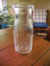 Sauquoit Valley embossed half Pint Milk Bottle, Utica, NY.