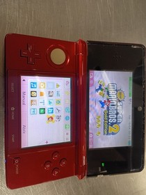 Nintendo 3DS Flame Red Console  games installed ( see photos and description )