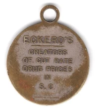 VINTAGE ECKERD'S DRUG MEDAL * Worn. * Big chain store from 1890s to 1990s