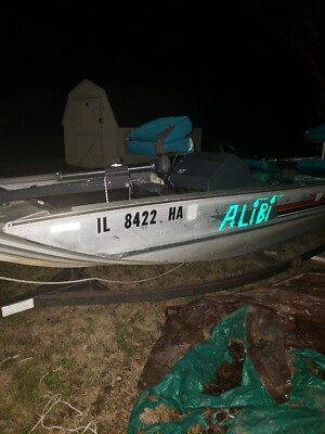 17 Ft Bass Tracker Pr0 With Q 40 Pure Johnson Outboard Motor And A 70 IB FC1988