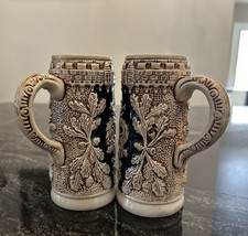 2- ORIGINAL KING  MUG Beer Stein SALZBURG 5 3/4  TALL HEAVY RAISED DESIGN EUC