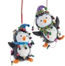 Kurt S. Adler 3.25-Inch Black and White Penguins With Colored Lights...