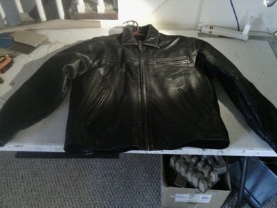 Used: Alexander Julian Colours Leather Jacket. R.N. number 65030 Genine Leather