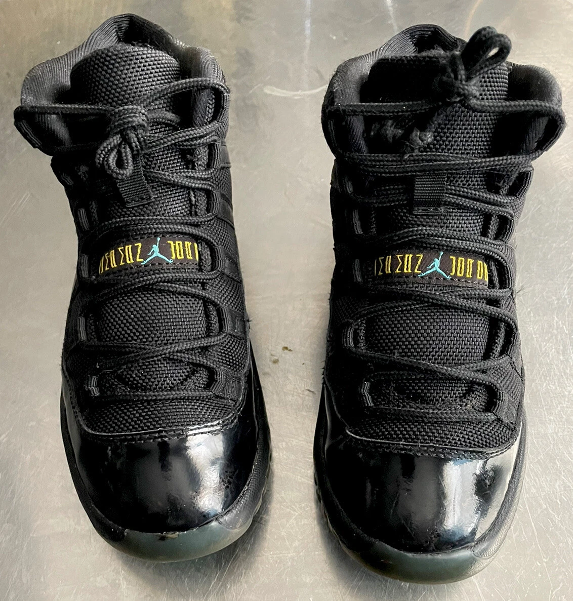 All black sales jordan 11 gamma