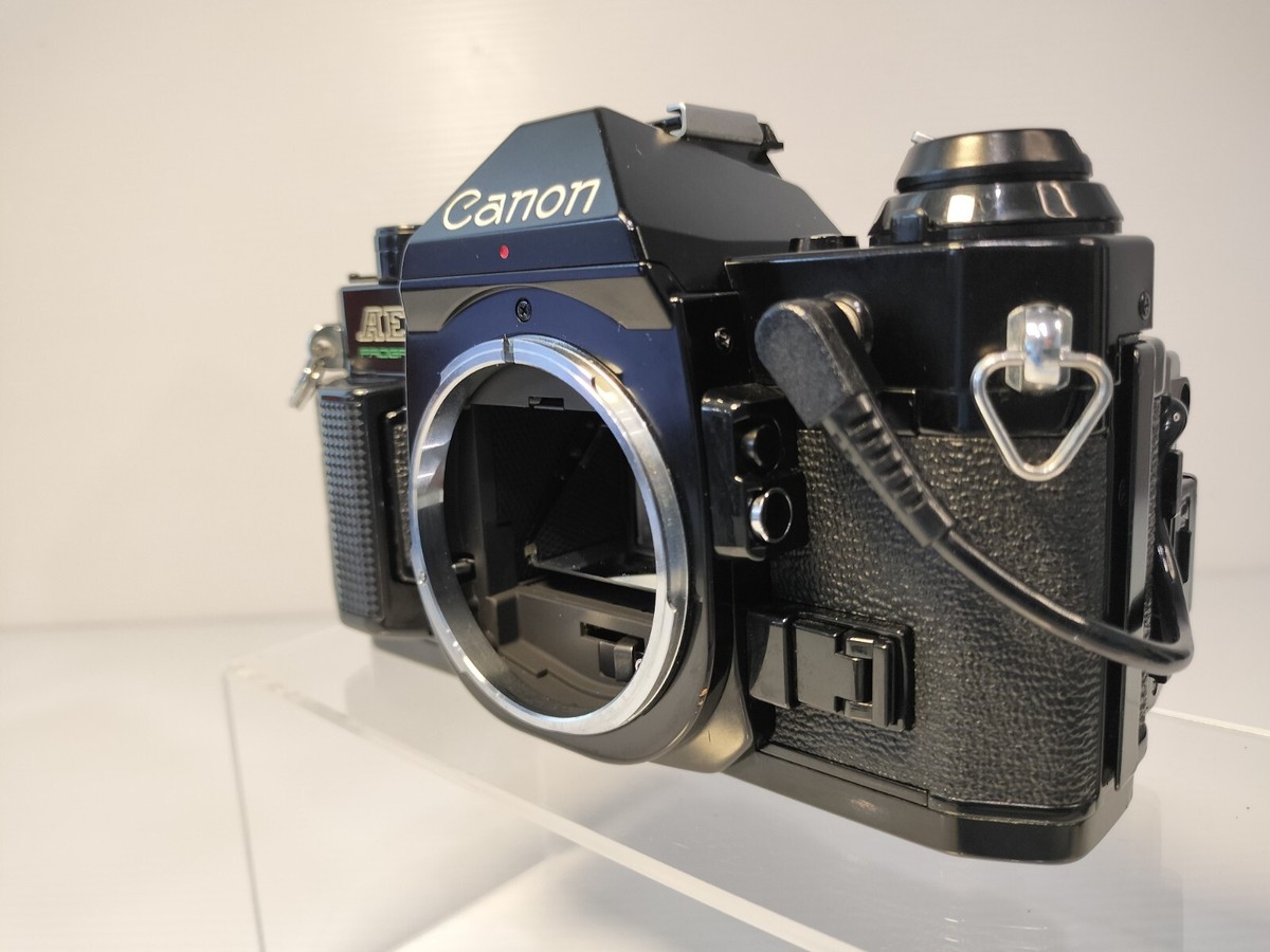 Canon AE-1 Program 35mm Film Camera w/FD 28-55mm f/3.5-4.5 Zoom