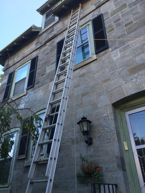 Used 40 foot, aluminum ladder with orange top-caps and extensions. Weighs 70 lbs