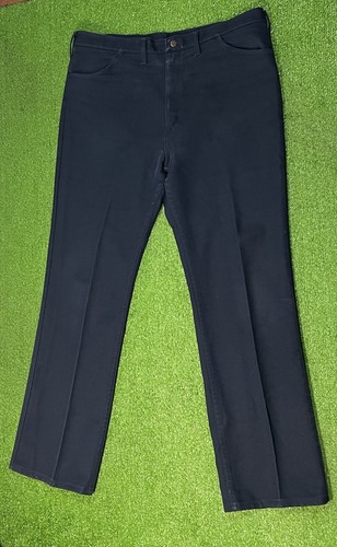 Dark navy blue vintage Wrangler Wrancher 40 x 34 bootcut jeans with five-pocket design and button closure, USA made.