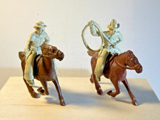 Marx 1950's pair of 60mm plastic Chubby Cowboys on brown horses.